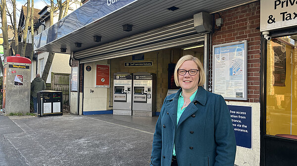 Zöe stands by Guildford station