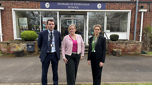 Zoe Franklin, Mr Baker and Ms Lee outside The Howard of Effingham School