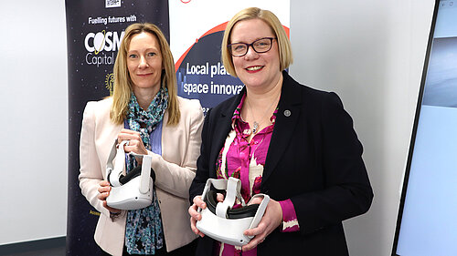 Caroline Fleming, Director of Surrey Innovation District at the University of Surrey, and Guildford’s MP Zöe Franklin showcase VR headsets