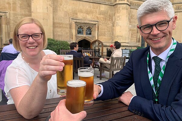 Zoe, Will and Al share a celebratory 0% half pint on the Parliament terrace.