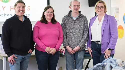 Zöe Franklin with members of Surrey Hills Baby Clothes Library team